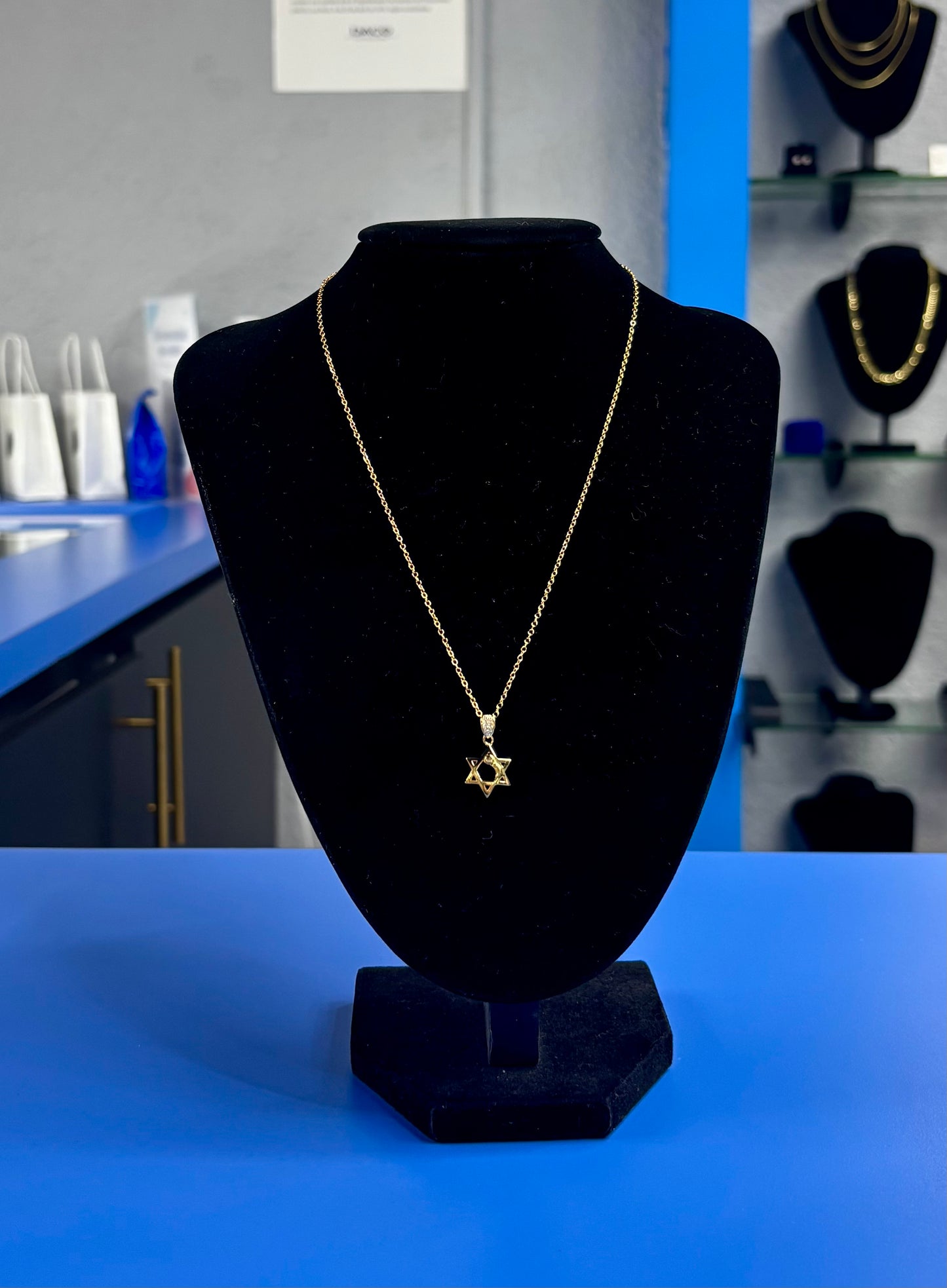 Cadena con pendant de Estrella